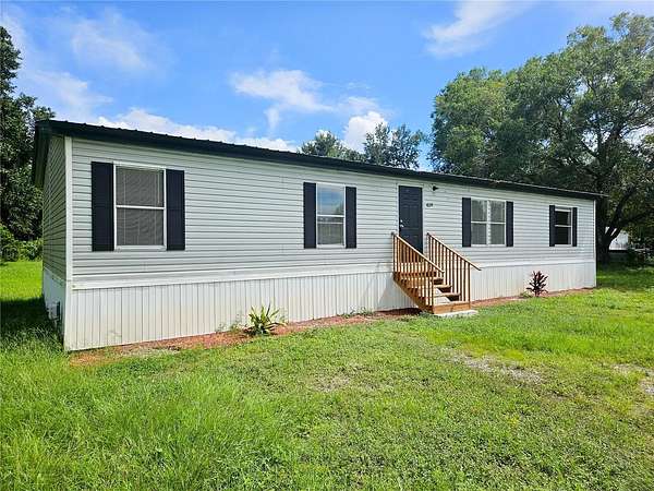 3.27 Acres of Land with Home for Lease in Polk City, Florida