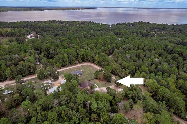 1.86 Acres of Land with Home for Sale in Coldspring, Texas