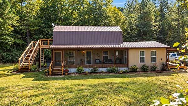 37.8 Acres of Recreational Land with Home for Sale in Linden, Tennessee
