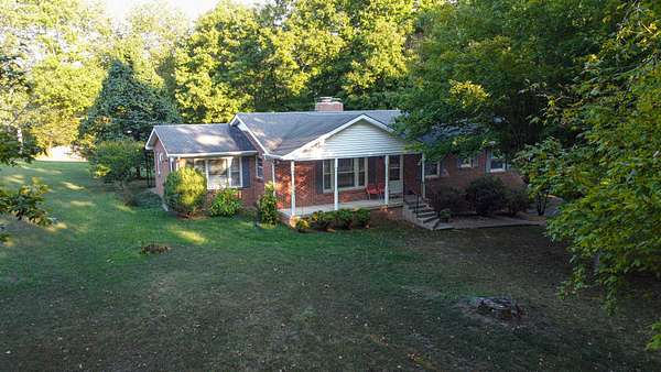 9.3 Acres of Land with Home for Sale in Clarksville, Tennessee