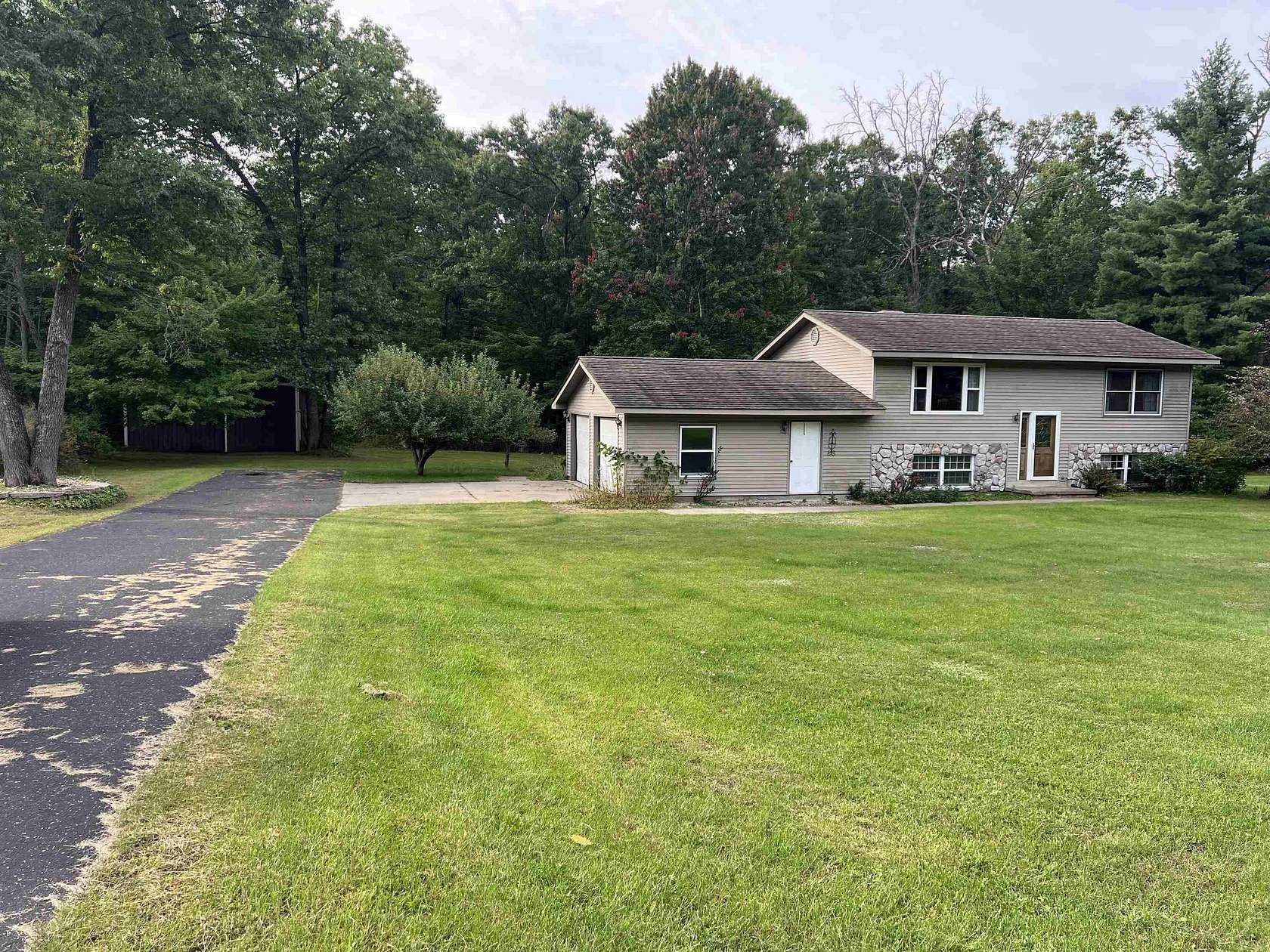 11.6 Acres of Land with Home for Sale in Harrison, Michigan