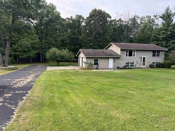 11.6 Acres of Land with Home for Sale in Harrison, Michigan