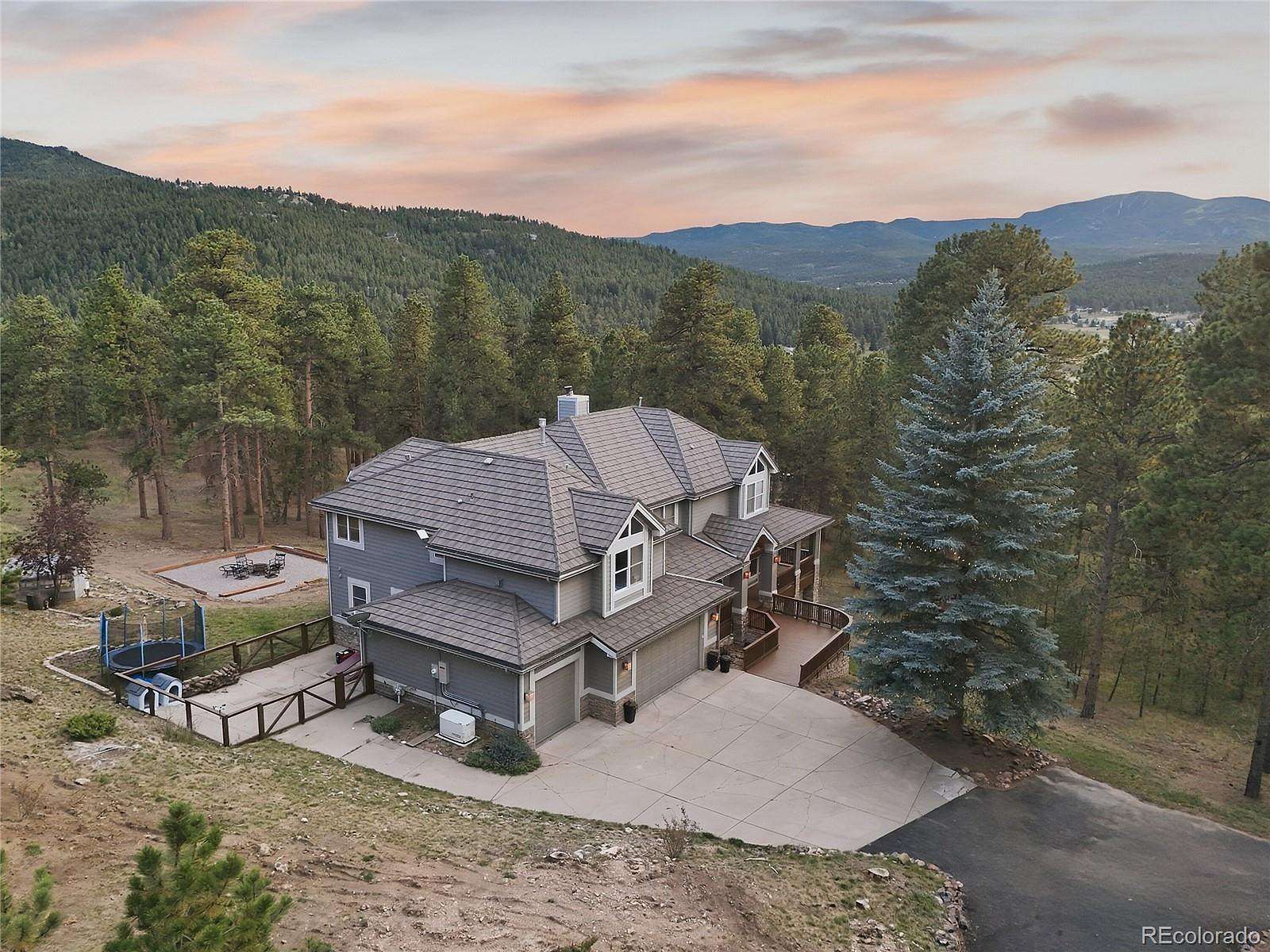 4.89 Acres of Land with Home for Sale in Evergreen, Colorado