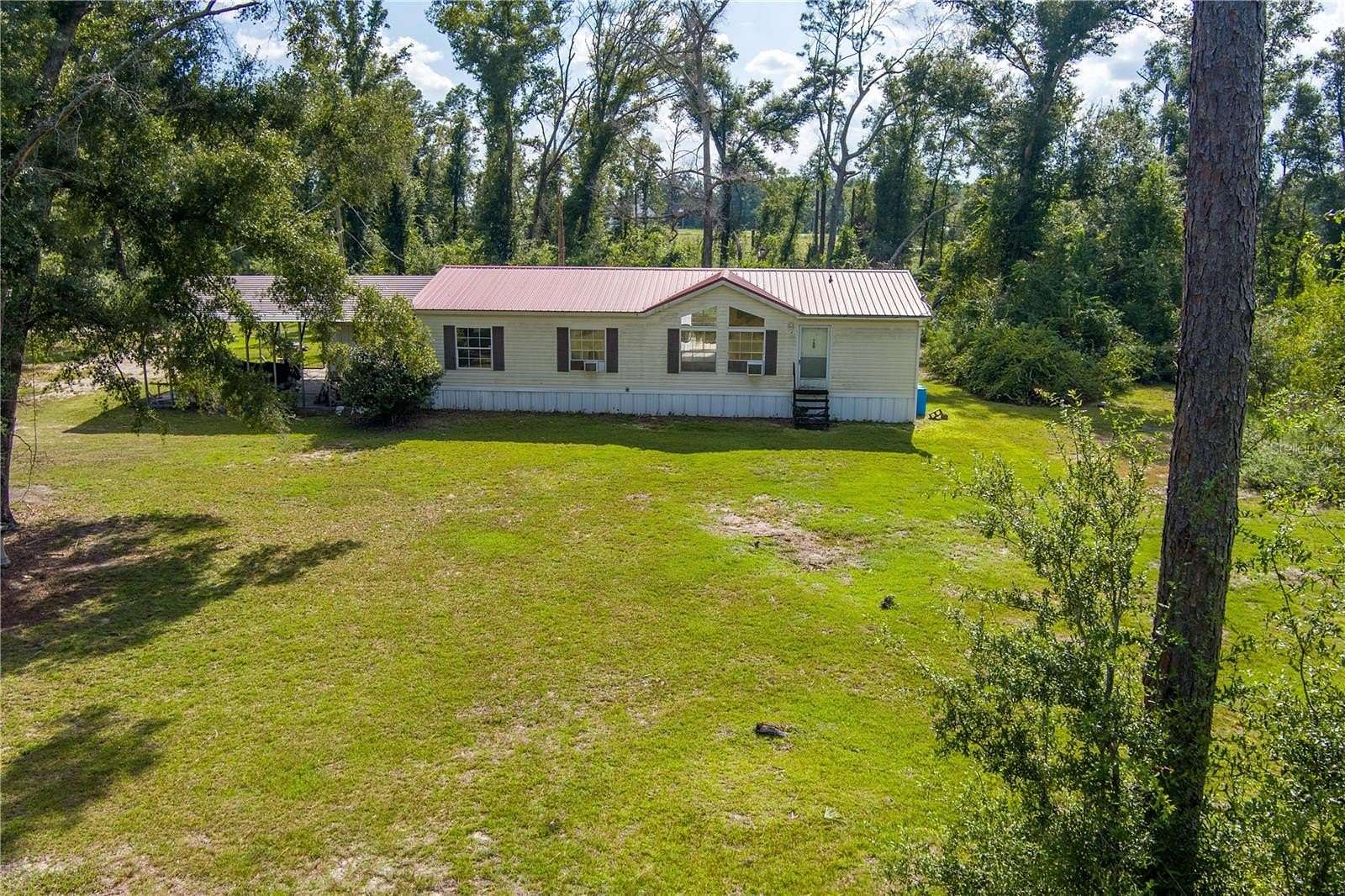 4.26 Acres of Land with Home for Sale in Live Oak, Florida