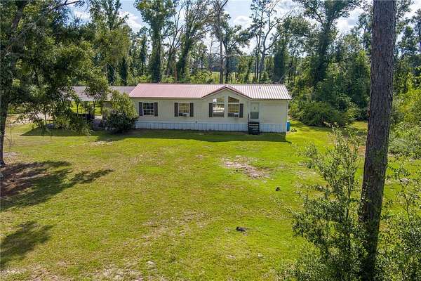 4.26 Acres of Land with Home for Sale in Live Oak, Florida