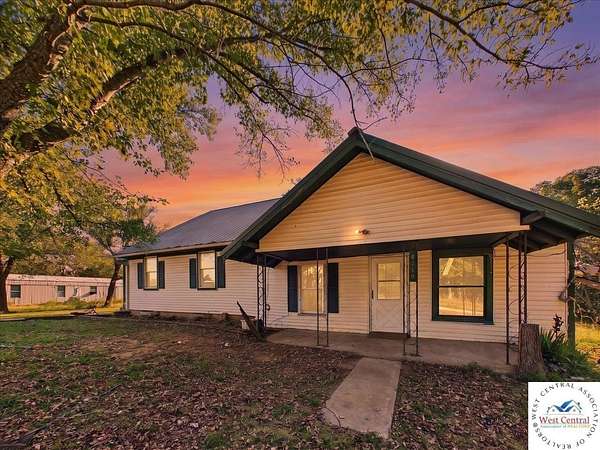5 Acres of Land with Home for Sale in Collins, Missouri