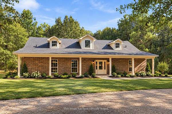 9.87 Acres of Land with Home for Sale in Henderson, Texas