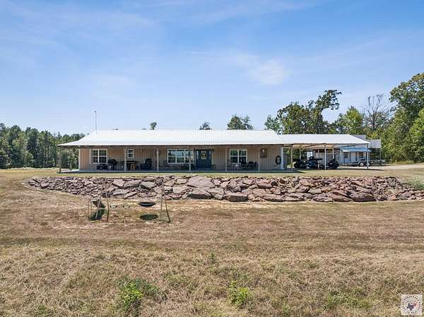 11.3 Acres of Land with Home for Sale in Queen City, Texas