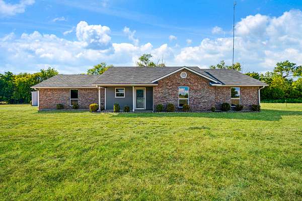 5 Acres of Land with Home for Sale in Paris, Texas