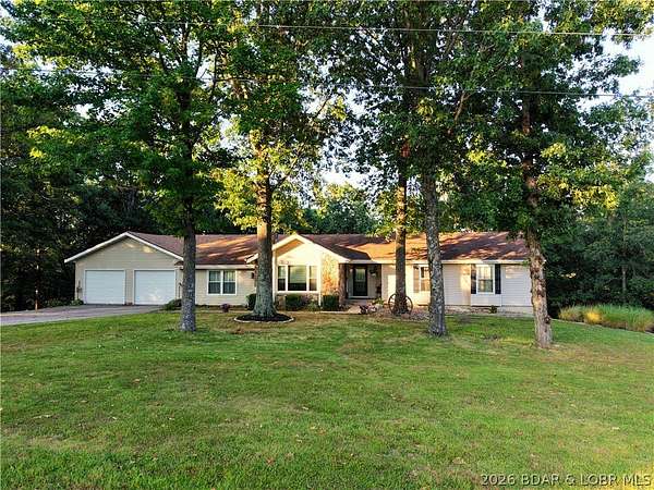 11.8 Acres of Land with Home for Sale in Versailles, Missouri