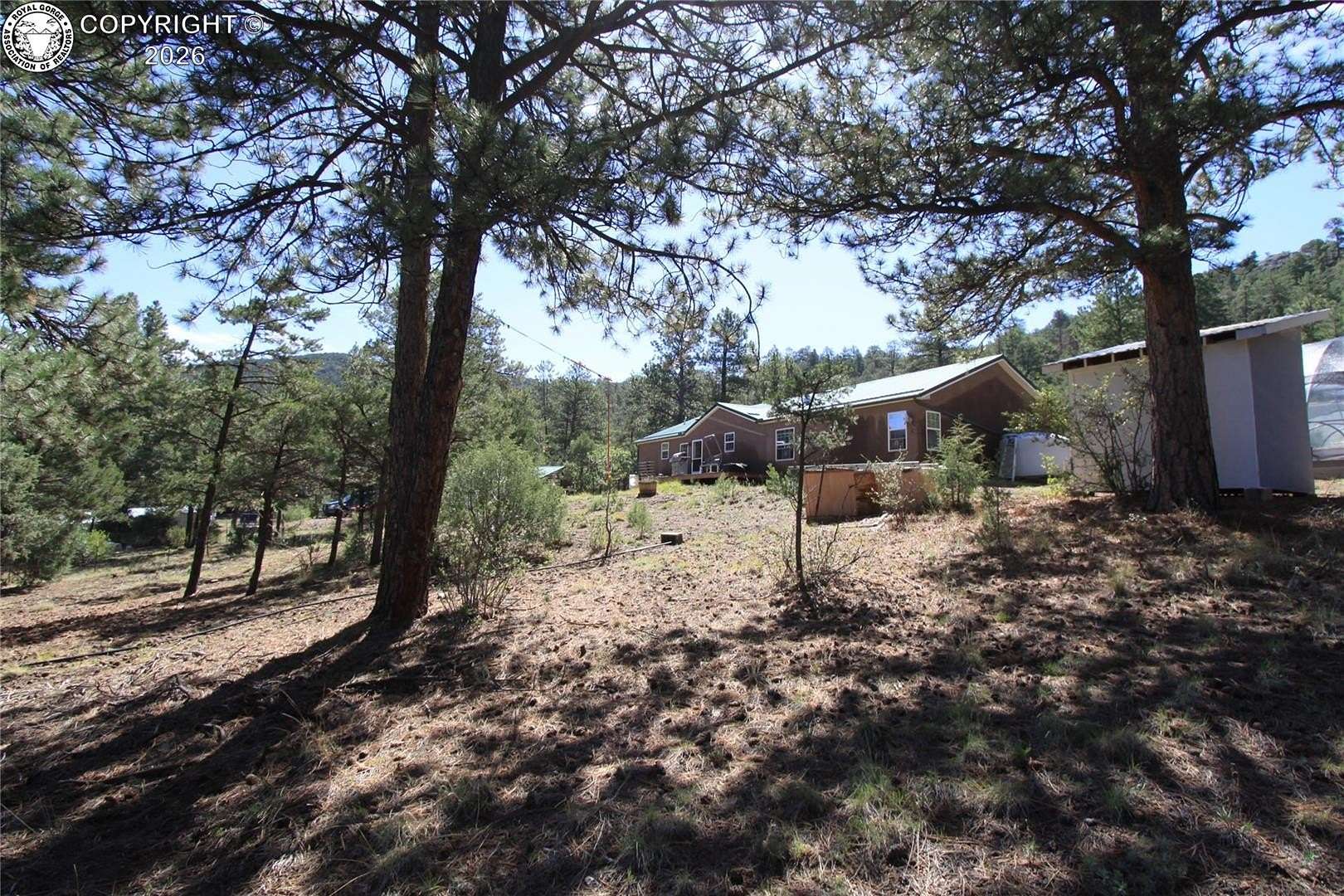 5.27 Acres of Land with Home for Sale in Cotopaxi, Colorado