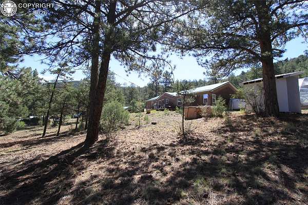 5.27 Acres of Land with Home for Sale in Cotopaxi, Colorado