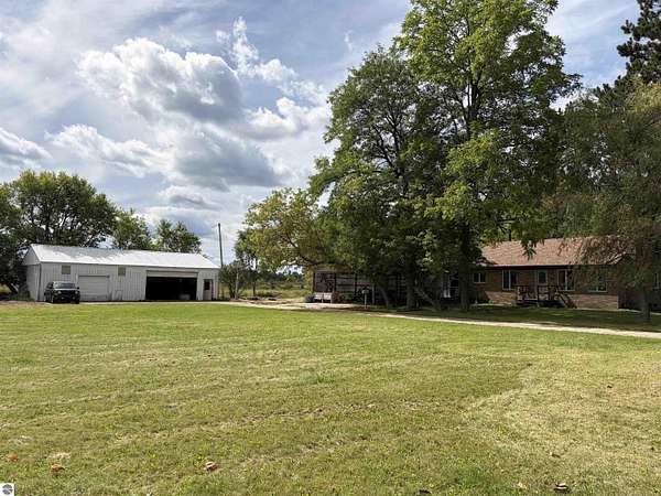 10 Acres of Recreational Land with Home for Sale in Lake City, Michigan