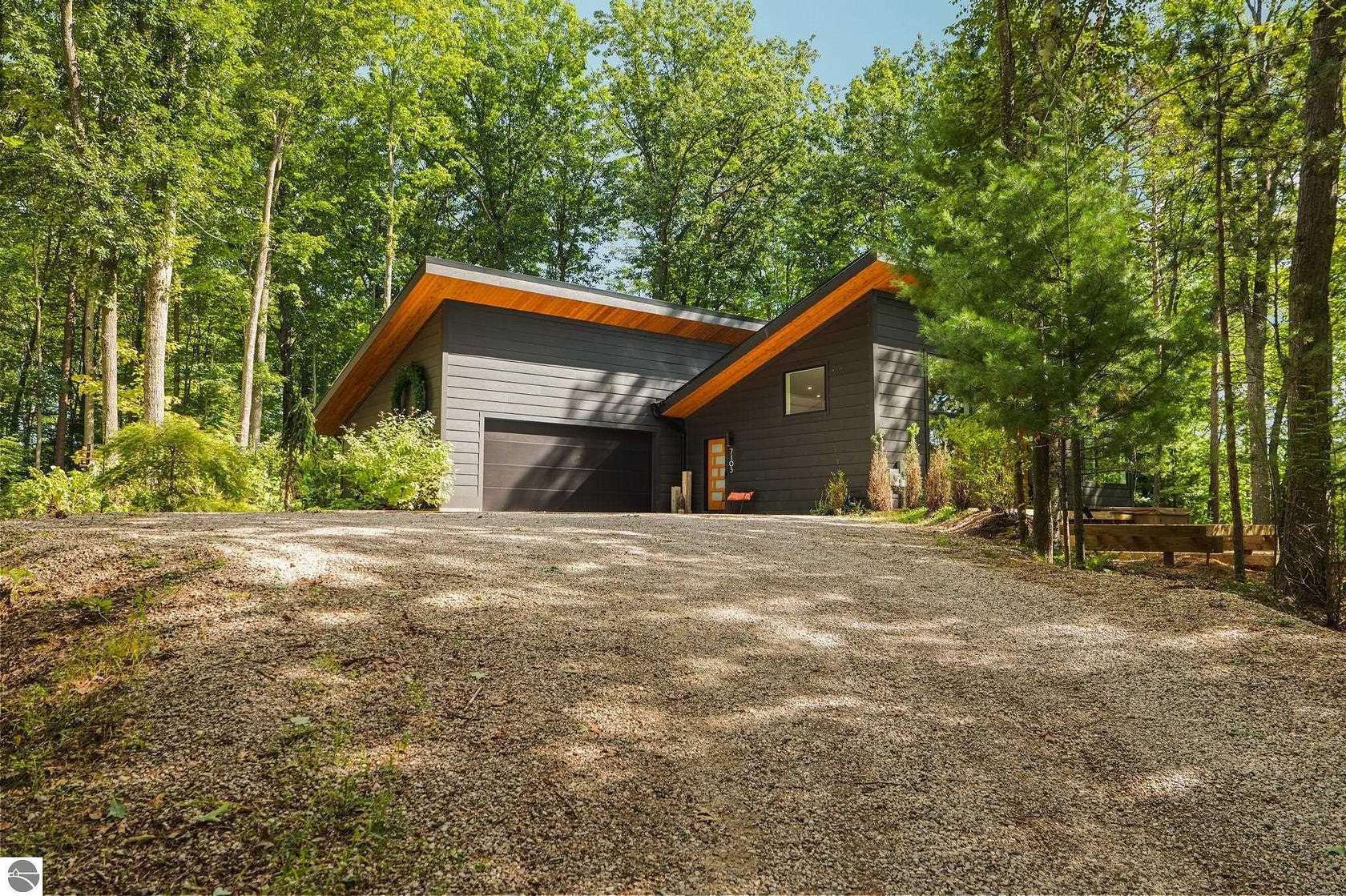 5.63 Acres of Land with Home for Sale in Lake Ann, Michigan