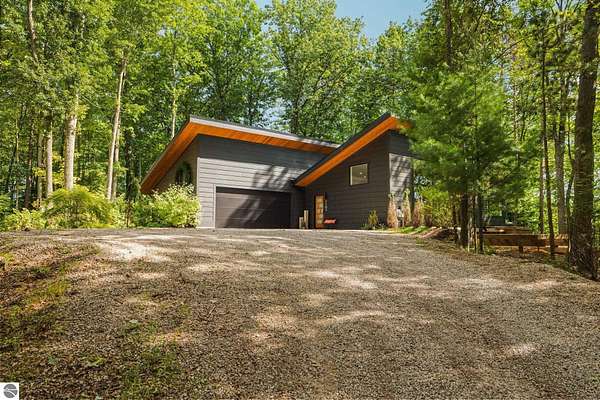 5.63 Acres of Land with Home for Sale in Lake Ann, Michigan
