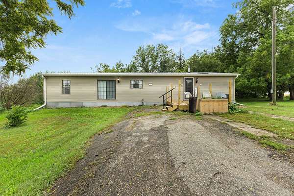 5.58 Acres of Land with Home for Sale in Melbourne, Iowa