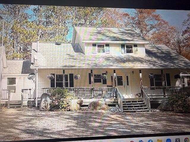 17 Acres of Land with Home for Sale in Bitely, Michigan