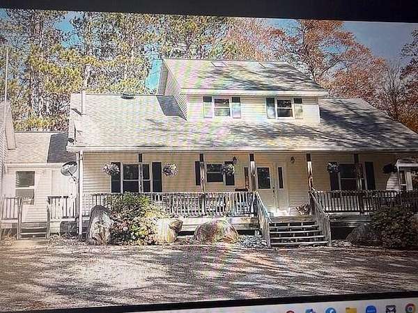 17 Acres of Land with Home for Sale in Bitely, Michigan