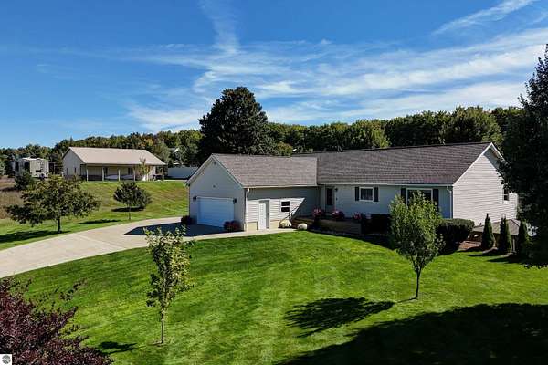 4 Acres of Land with Home for Sale in Kalkaska, Michigan