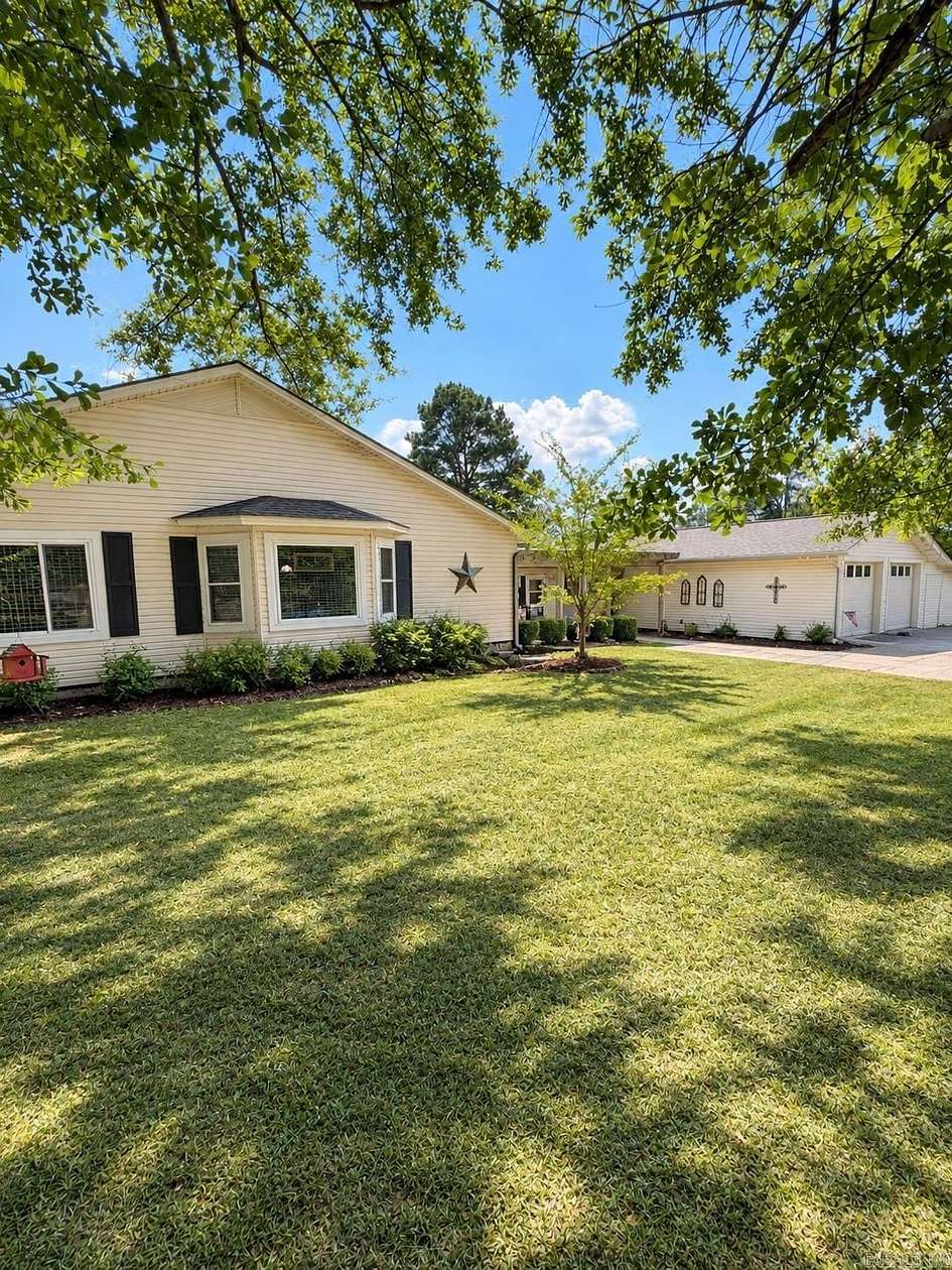 11.3 Acres of Land with Home for Sale in Wilmar, Arkansas