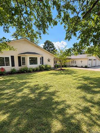 11.3 Acres of Land with Home for Sale in Wilmar, Arkansas