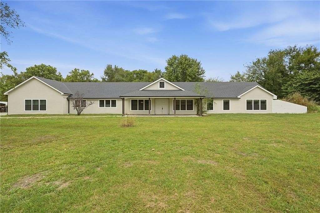 10 Acres of Land with Home for Sale in Belton, Missouri