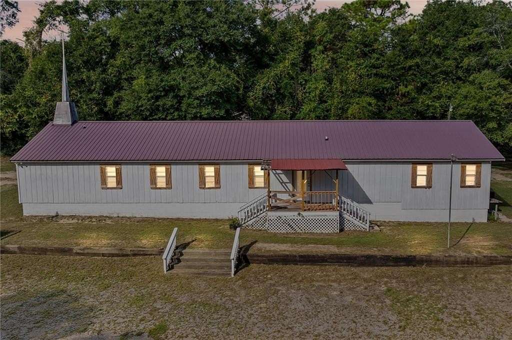6.3 Acres of Land with Home for Sale in Saraland, Alabama