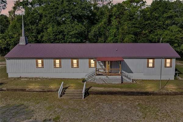 6.3 Acres of Land with Home for Sale in Saraland, Alabama