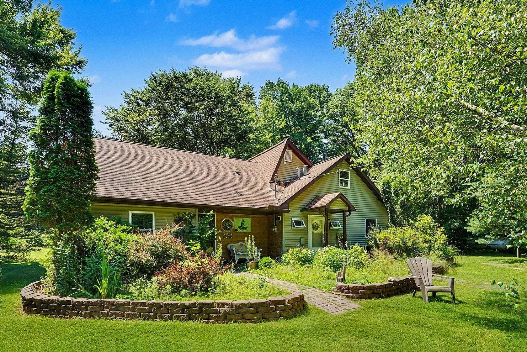 10.1 Acres of Recreational Land with Home for Auction in Grand Junction, Michigan