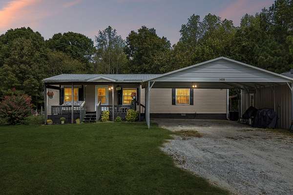 9.62 Acres of Land with Home for Sale in Camden, Tennessee