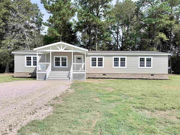 5.9 Acres of Land with Home for Sale in Moscow, Tennessee