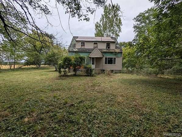 2 Acres of Land with Home for Sale in Elmer Township, Michigan