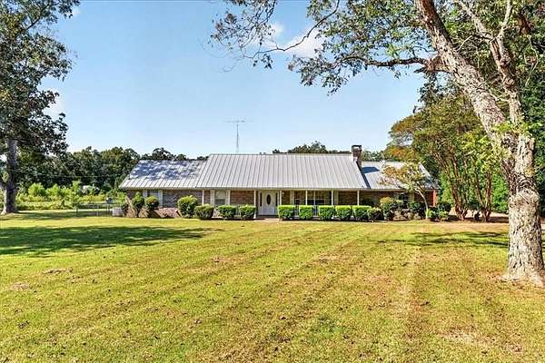 7 Acres of Land with Home for Sale in Grand Bay, Alabama