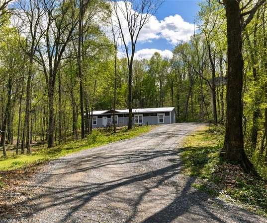 5.55 Acres of Land with Home for Sale in Muldrow, Oklahoma
