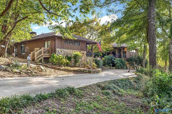107 Acres of Land with Home for Sale in Hayden, Alabama