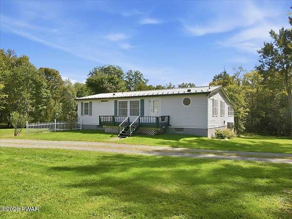 3 Acres of Land with Home for Sale in Beach Lake, Pennsylvania