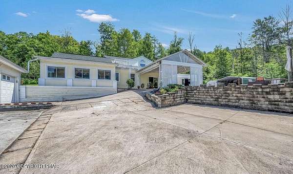 9.9 Acres of Land with Home for Lease in Scott Township, Pennsylvania