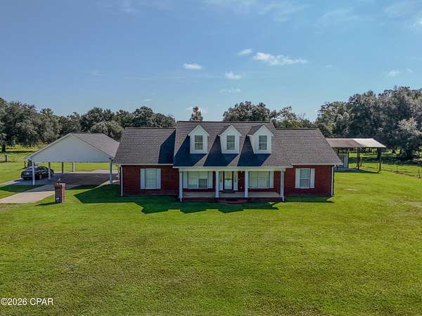 20 Acres of Land with Home for Sale in Sneads, Florida