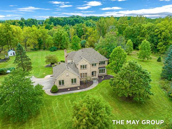 14.7 Acres of Land with Home for Sale in Ada, Michigan