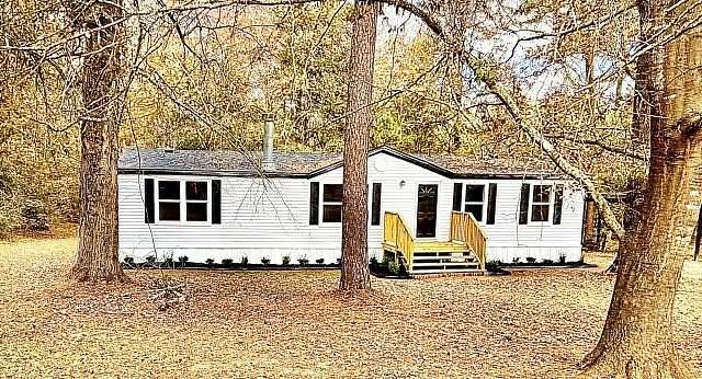 2.56 Acres of Land with Home for Sale in Longview, Texas