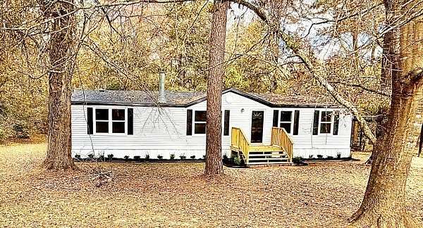2.56 Acres of Land with Home for Sale in Longview, Texas