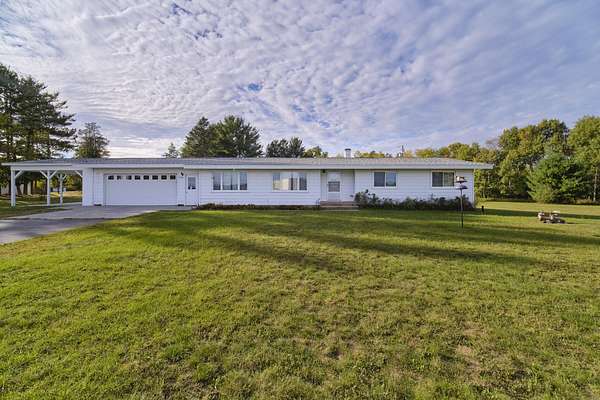 10.7 Acres of Land with Home for Sale in Manistee, Michigan