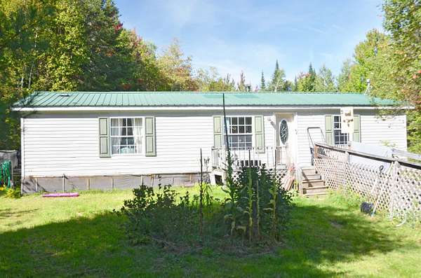5 Acres of Land with Home for Sale in Brighton Town, Vermont