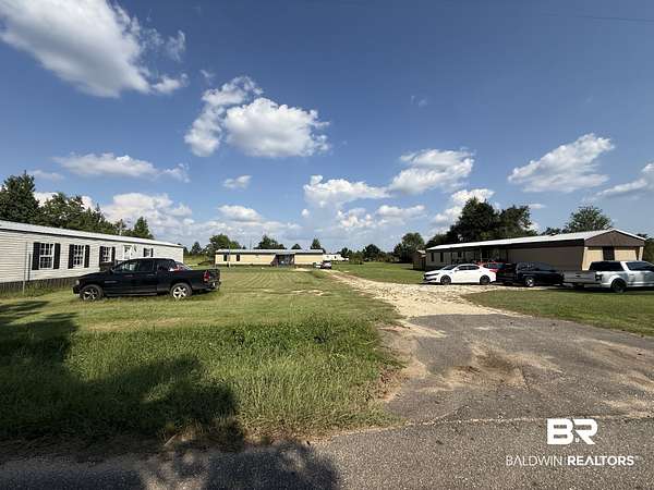 1.59 Acres of Improved Residential Land for Sale in Perdido, Alabama