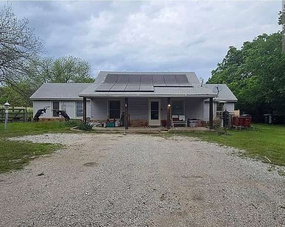 5 Acres of Land with Home for Sale in Springtown, Texas