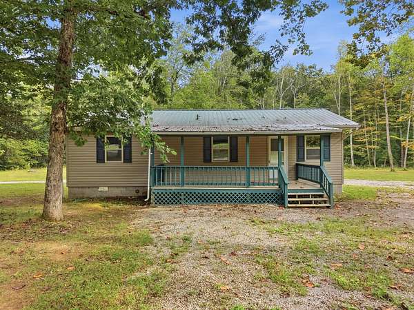 3.9 Acres of Land with Home for Sale in Crossville, Tennessee