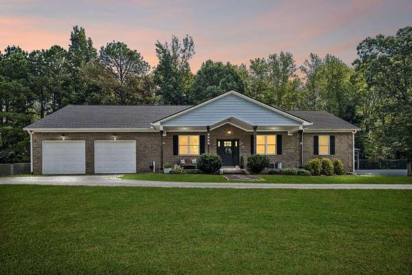 21.7 Acres of Land with Home for Sale in Camden, Tennessee