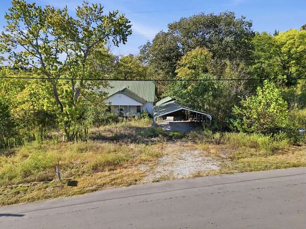 8.34 Acres of Land with Home for Sale in Watertown, Tennessee