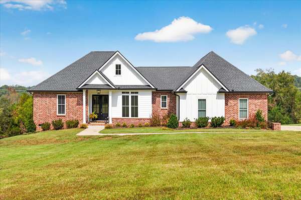 10 Acres of Land with Home for Sale in Palmyra, Tennessee