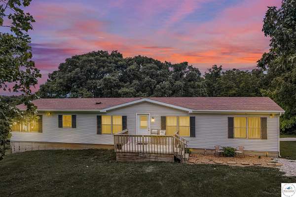 12.4 Acres of Land with Home for Sale in Sedalia, Missouri